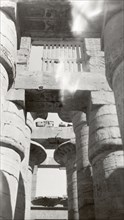 Columns of the Great Hypostyle Hall. Upward view of several stone columns of the Great Hypostyle