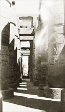 Columns of the Great Hypostyle Hall. An avenue of stone columns at the Great Hypostyle Hall,