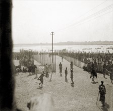 Procession route to the Triveni Sangam. Staked fences mark the procession route down to the Triveni