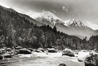 Sheshnag Mountain from the Pahalgam Valley. The snow-capped peaks of Sheshnag Mountain rise up