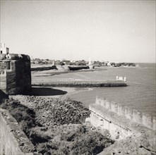 A breakwater on Diu Island. A breakwater extends into the sea from the old fort on Diu island,