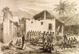 The Slave Market, Zanzibar'. An engraving from the 'Illustrated London News' depicts Arab merchants