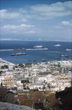 A view over Gibraltar town and harbour. View from high ground across the city and harbour of