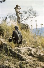 James Lang Brown looks for a 'kituti'. Accompanied by a Suk porter, District Forest Officer James