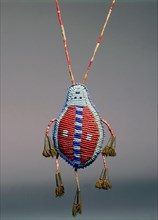 Beaded buckskin pouch in the form of a beetle