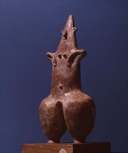 A mother goddess / fertility figure with emphasized hips and navel
