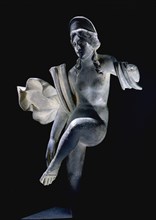 A statue of a Dancing Venus with flowing drapery and an arching canopy over her head