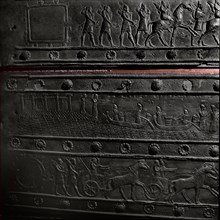 The wooden gates of Shalmaneser III with bands of relief decoration in bronze