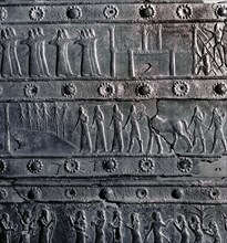 The wooden gates of Shalmaneser III with bands of relief decoration in bronze