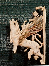 Phoenican ivory plaque depicting part of a griffin