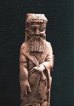 Fragment of a Phoenician   style ivory of a bearded head found in an Assyrian palace