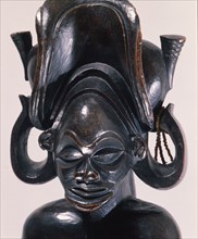 Chief wearing typical Chokwe chiefs headdress