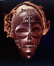 Dance mask of a type known as Mwana Pwo, regarded as an idealised depiction of a beautiful young girl