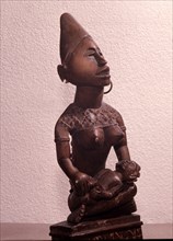 Mother and child carving (phemba) honouring female reproductive power, an idealised image of womens role, and by implication of the growth and wealth of the kingdom
