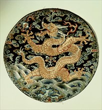 A badge from a court officials robe with embroidery dragon, the symbol of the fertilising rain