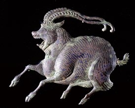 Plaque in the form of a fantastic animal with exaggerated horns