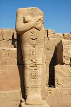 Headless statue of a pharaoh