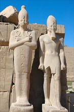 Two statues of pharaohs