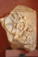 Relief showing Ixion, father of the Centaurs being tortured by Zeus in punishment for his attempted seduction of Hera