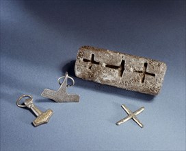 Smiths mould for casting both Christian crosses and Thors hammers
