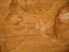 Rock painting of a humans