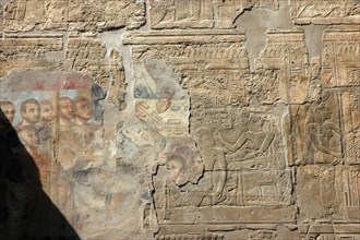 Wall reliefs from the period of Amenhotep III plastered over during Roman times with colourful images of Roman Emperors prior to the conversion into a Christian Chapel