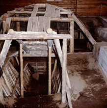 Winter houses in Southwest Alaska were dug a metre or more into the ground, lined with timber and covered with sod