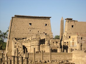 View of the Great Pylon entrance to the Luxor temple and the remains of the Abu el Haggag mosque