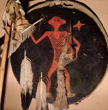 A war medicine shield depicting the Moon which appeared to the owner in a dream and gave him the shield
