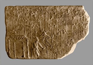 Brick from a tomb structure impressed with design of agricultural scene