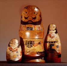 Painted wooden dolls which stack one inside the other