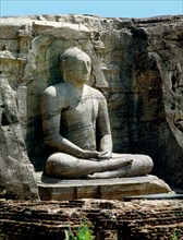 Rock sculpture of the seated Buddha at Gal Vihara at Polonnaruwa