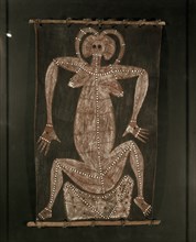 Bark painting from western Arnhem Land depicting a seated woman