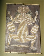 Bark painting from western Arnhem land, depicting a woman with two dilly bags and a digging stick