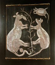 Bark painting in X ray style depicting a pair of kangaroos