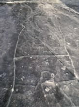 Petroglyph incised in the rock at an aboriginal sacred site