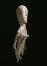 Painted wooden aboriginal figure of a woman