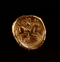 Coin showing a horseman equipped in typical Celtic style