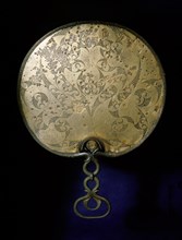 Bronze mirror with richly engraved back