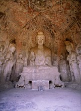 The Longmen cave temple complex which extends for about 1000m along the Yi River