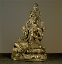 A statue of a goddess, possibly a form of Tara