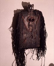 A mask known as loniaken worn during male initiations, which took place only once each generation
