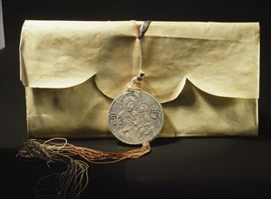 A parchment cover of a document called a chrysobull because its gold seal, in which Emperor Andronicus II granted favours to the Metropolitan of Monevasia in the Peloponnese