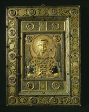 A relief icon with a central panel with a bust of the Archangel St Michael surrounded by enamelled medallions with saints