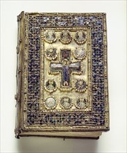 A binding of a liturgical book which is richly encrusted with enamels and pearls