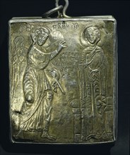 The reverse of the small gold and enamel reliquary with a figure of the Virgin Mary on one side and the Annunciation on the reverse