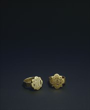 Personal jewellery such as these finger rings were often decorated with secular themes but the existence of many items of jewellery decorated with religious subject matter indicates how interwoven the...