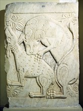 Relief carving of a lion devouring a gazelle