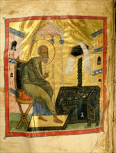 An illumination depicting St John the so called Theologos writing at his desk