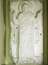 Slab depicting Virgin Mary greeting the faithful